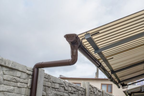 Plastic Downspout Installation in Tucker